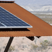 rural house in Arizona with rooftop solar panels