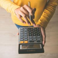 woman using a calculator