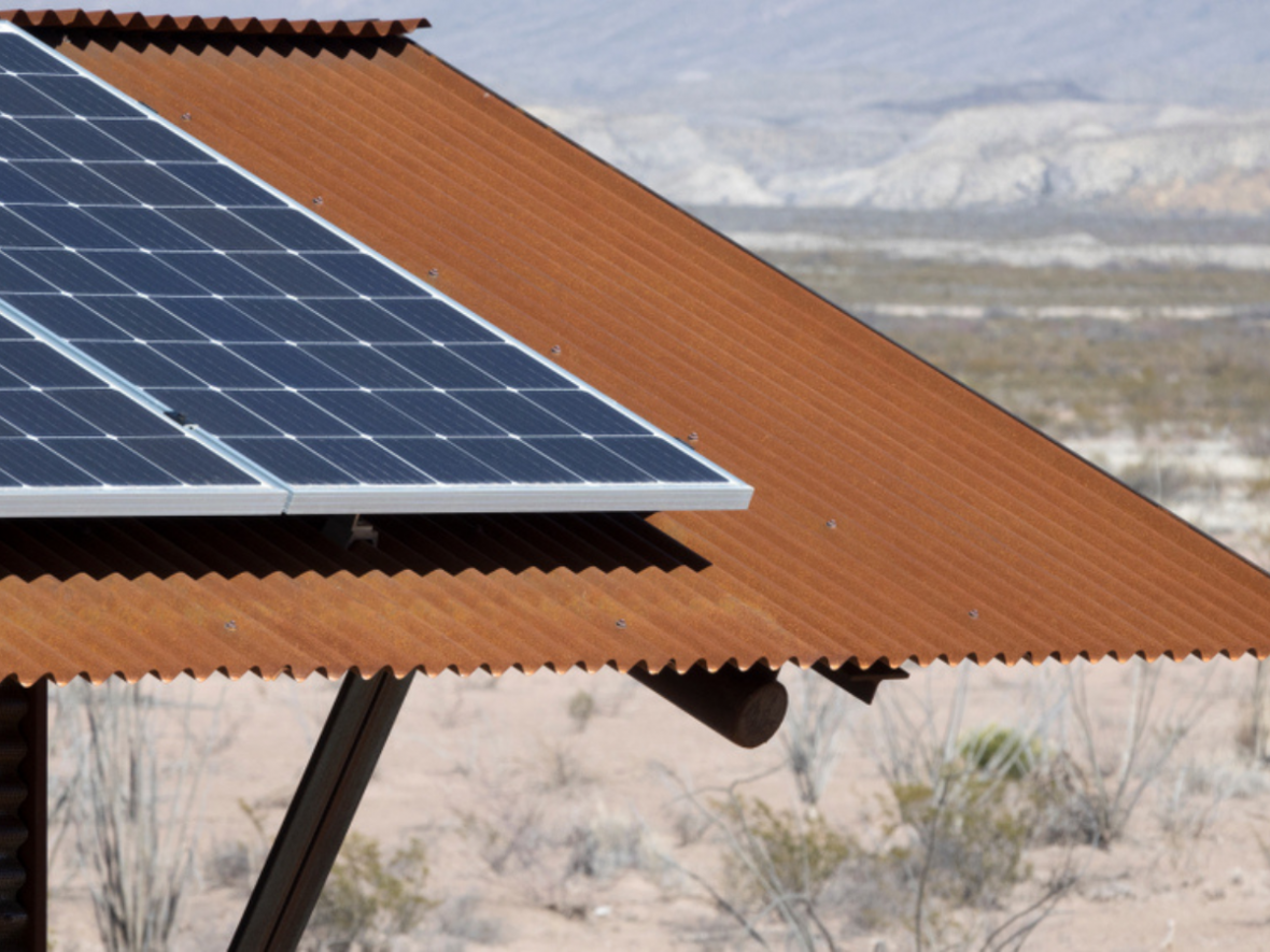rural house in Arizona with rooftop solar panels