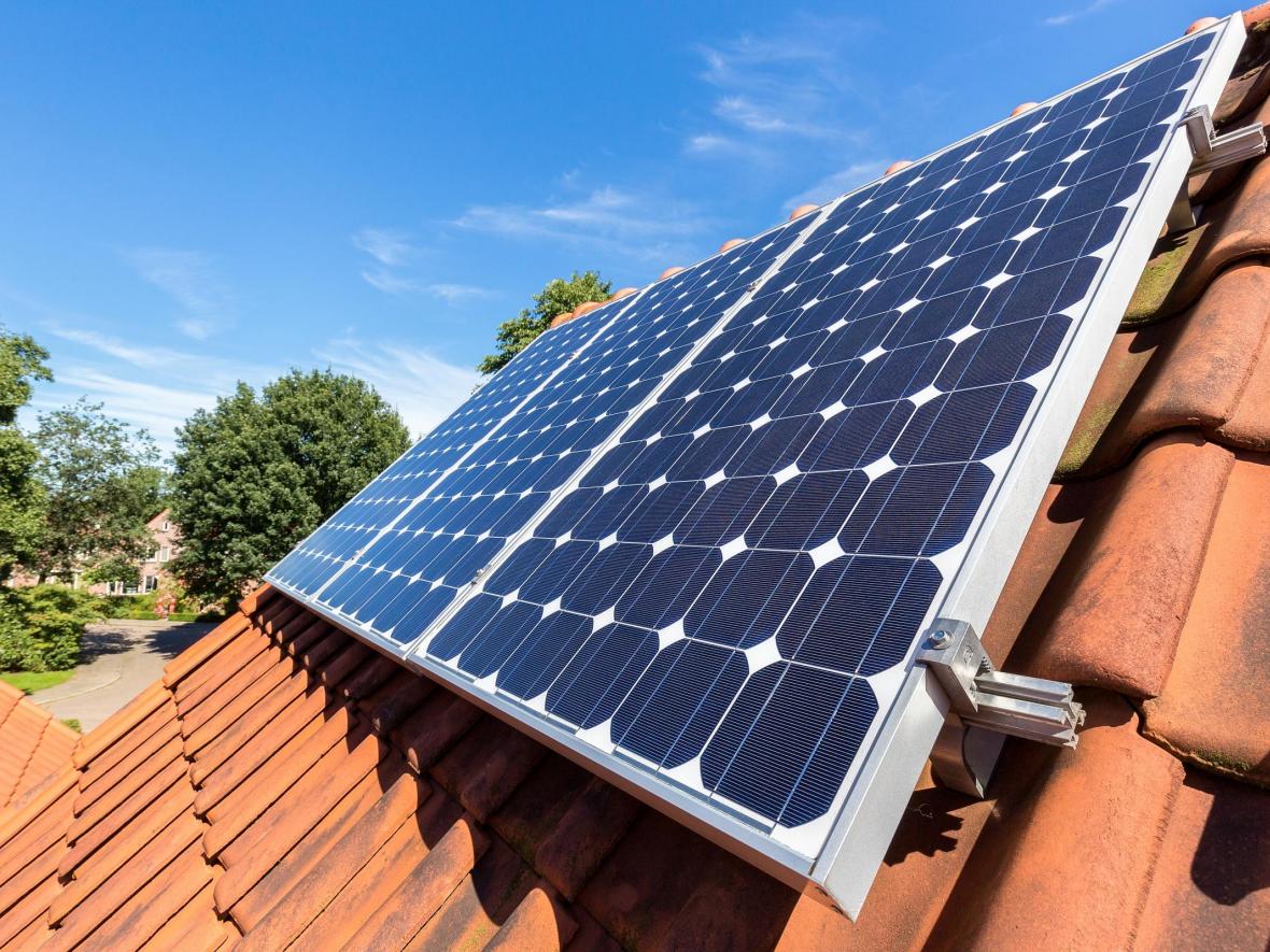 orange with roof solar panels