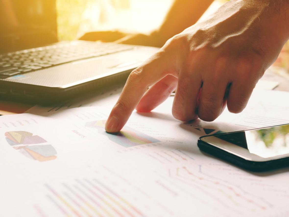 hands and financial documents hands and financial documents