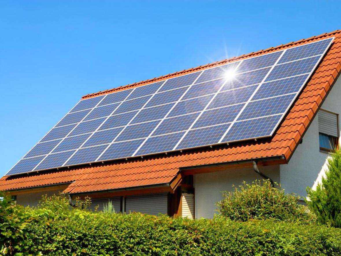 solar panels on the roof of a house solar panels on the roof of a house