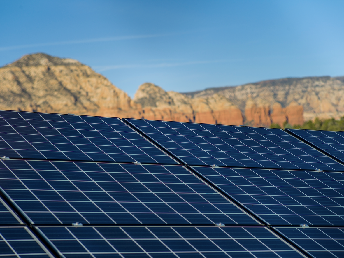 solar panel in front of mountains