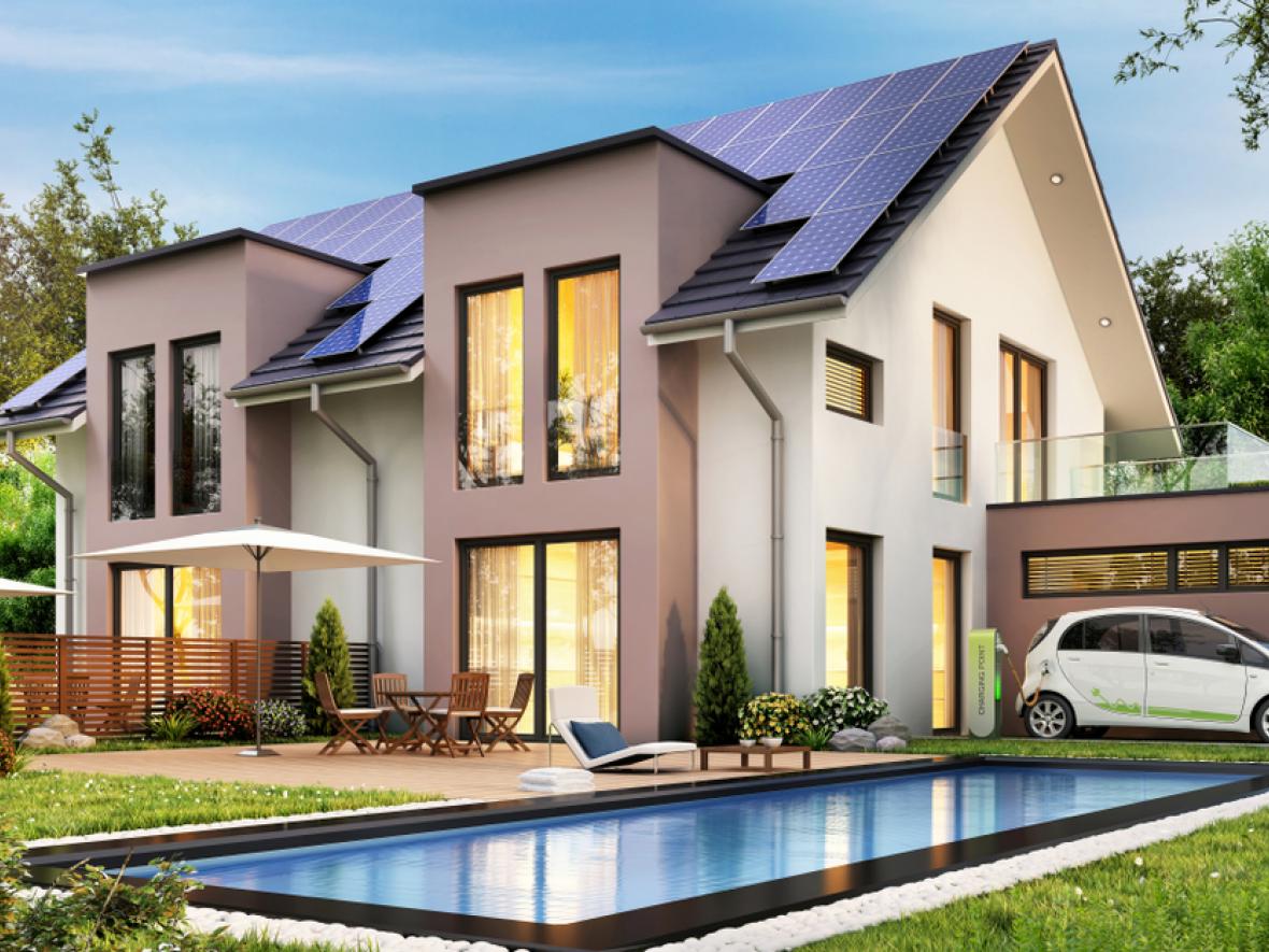 modern house with smart car and solar panels