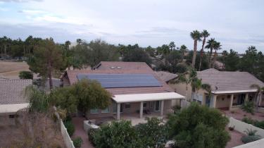 AZ house in neighborhood with solar panels